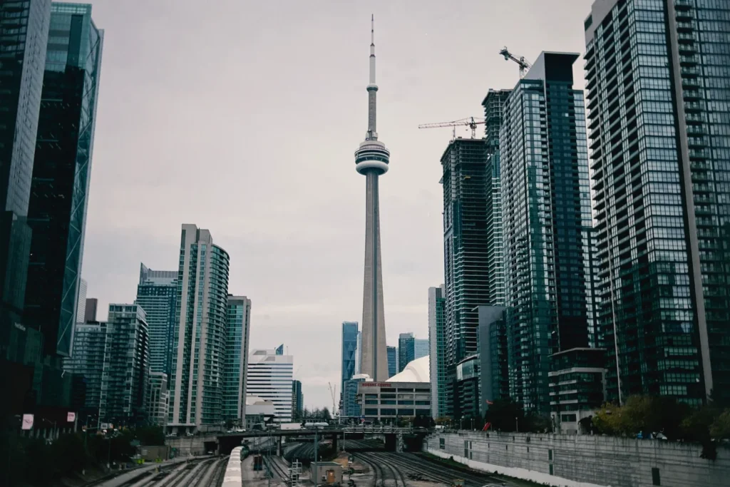 CN Tower rising above Toronto glass towers