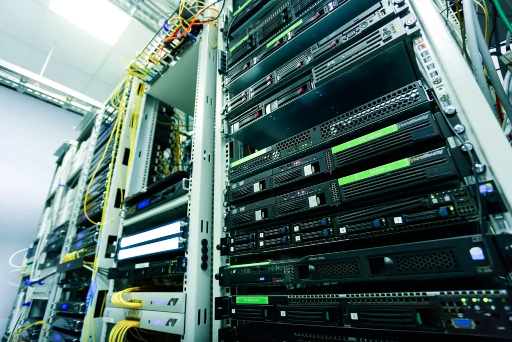 Server rack with cabling being reviewed during an infrastructure audit